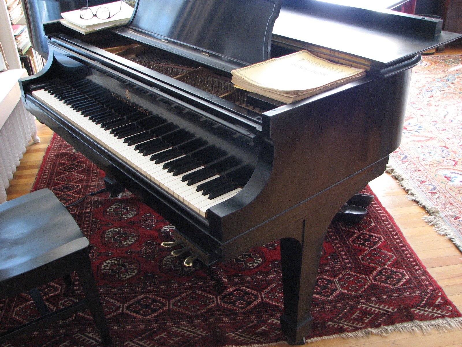 Photo of Russell’s piano in his home.